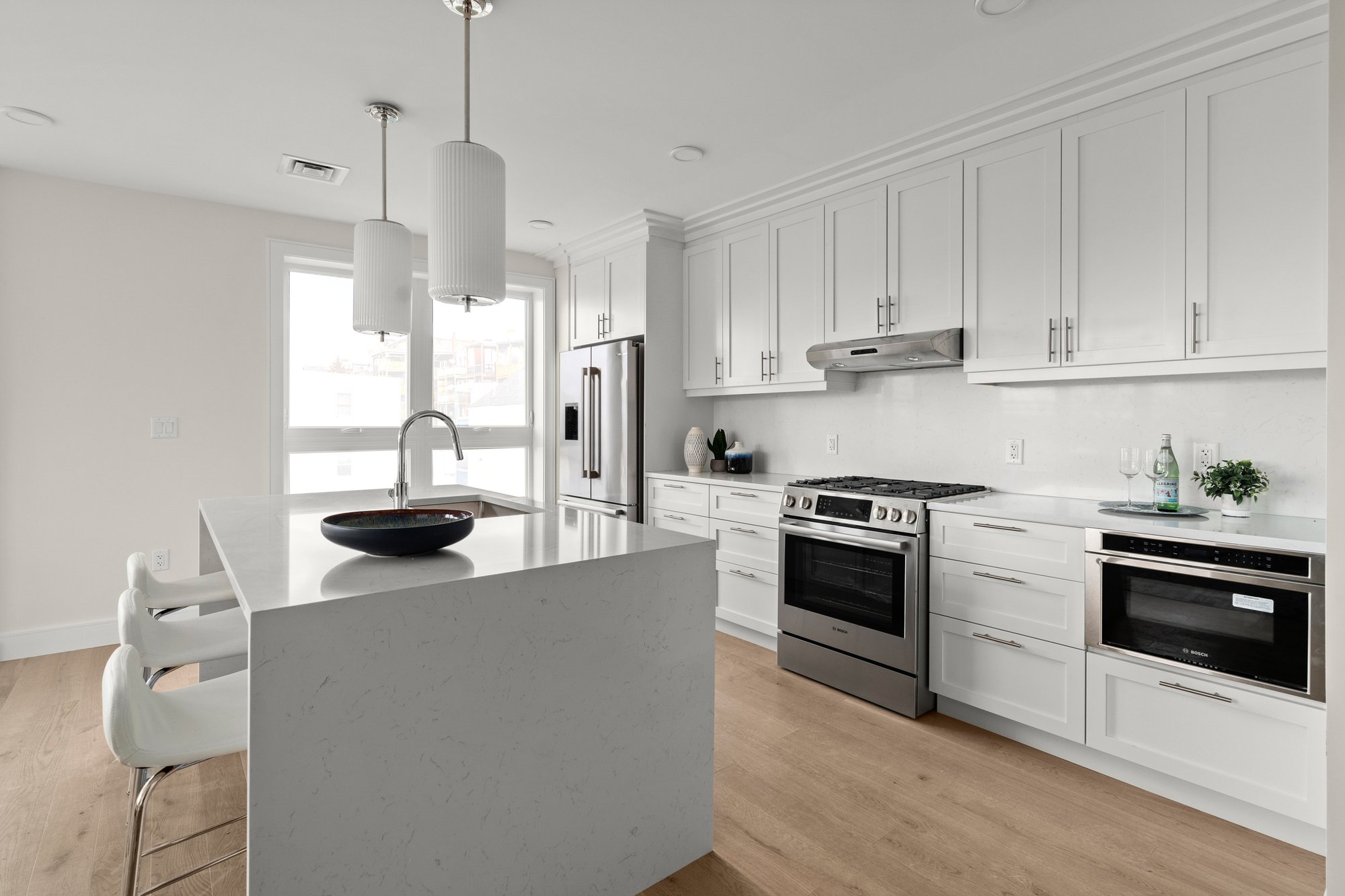 Kitchen with island and island seating