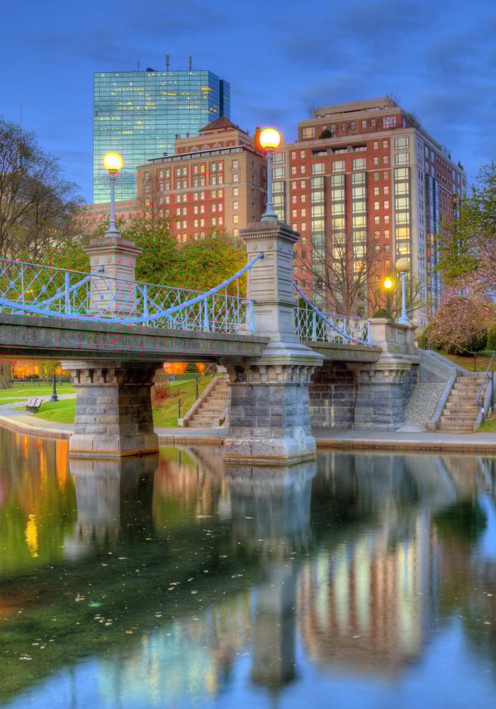 Lagoon Bridge and skyline of Boston, Massachusetts fromthe Boston Public Gardens. Lagoon Bridge and skyline of Boston, Massachusetts fromthe Boston Public Gardens.